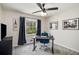 Modern office space with a sleek desk, comfortable chair, and a window overlooking a lush landscape at 3021 Favor Pines Sw Ct, Marietta, GA 30060