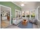 Relaxing sun room with ample seating, natural light, and a view of the backyard at 3021 Favor Pines Sw Ct, Marietta, GA 30060