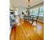 Bright dining room with hardwood floors and large windows, perfect for entertaining at 684 N Cherokee N Rd, Social Circle, GA 30025