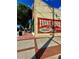 A charming diner exterior with a mural that says 