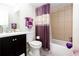 Cozy bathroom featuring a shower/tub, a toilet, sink, and vanity with storage space at 875 Edgewater Cir, Marietta, GA 30062