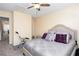 Bedroom showcasing a comfortable bed, plush pillows, and an exercise machine for fitness at 875 Edgewater Cir, Marietta, GA 30062