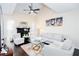 Bright living room with vaulted ceilings, fireplace, and modern decor at 875 Edgewater Cir, Marietta, GA 30062