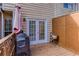 Outdoor patio with grill, perfect for al fresco dining or summer barbecues at 875 Edgewater Cir, Marietta, GA 30062