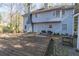 Home backyard with wooden deck and patio at 2887 Swarthmore Dr, Lawrenceville, GA 30044