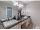 Spacious bathroom featuring dual sinks with bright lighting and plenty of counter space at 2887 Swarthmore Dr, Lawrenceville, GA 30044