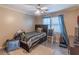 Bedroom with a wooden bed frame and plush carpet at 2887 Swarthmore Dr, Lawrenceville, GA 30044