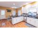 Bright kitchen with stainless steel appliances, granite countertops, and hardwood flooring at 2887 Swarthmore Dr, Lawrenceville, GA 30044