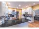 Gourmet kitchen with an island, granite countertops, and stainless steel appliances for culinary excellence at 2887 Swarthmore Dr, Lawrenceville, GA 30044