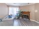 Cozy living room with a fireplace and light gray floors at 2887 Swarthmore Dr, Lawrenceville, GA 30044