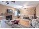 Cozy living room with a fireplace, neutral walls, and plush seating at 2887 Swarthmore Dr, Lawrenceville, GA 30044