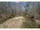 Wide creek running through the property, surrounded by trees, enhancing the natural beauty at 939 Jean Ct, Covington, GA 30014