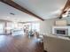 Open floor plan connecting the living room, kitchen, and dining area, featuring hardwood floors at 939 Jean Ct, Covington, GA 30014