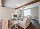 Comfortable living room features a fireplace and large windows for natural light at 939 Jean Ct, Covington, GA 30014