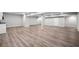 Spacious basement has recessed lighting and durable flooring at 1590 Highland Farm Dr, Suwanee, GA 30024