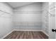 Walk-in closet with wire shelving for optimal storage solutions at 1590 Highland Farm Dr, Suwanee, GA 30024