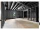 Unfinished basement with exposed ceiling and wooden studs at 3407 Deerwood Ct, Rex, GA 30273