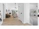 Inviting entryway with hardwood floors that leads into the living room at 3407 Deerwood Ct, Rex, GA 30273