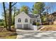 Charming home with a two-car garage and well-maintained landscaping at 3407 Deerwood Ct, Rex, GA 30273