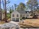 Beautifully landscaped home with an attached two car garage at 3407 Deerwood Ct, Rex, GA 30273