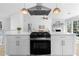 Updated kitchen with large island, stainless appliances, and open to living area at 3407 Deerwood Ct, Rex, GA 30273