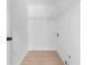 Walk-in closet featuring wire shelving and light-colored floors at 3407 Deerwood Ct, Rex, GA 30273