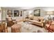 The comfortable living room is illuminated by natural light and is ready for relaxation and entertainment at 4590 Lake Forrest Nw Dr, Atlanta, GA 30342