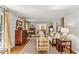 Comfortable living room featuring hardwood floors, neutral tones, and a seamless flow to adjacent spaces at 4590 Lake Forrest Nw Dr, Atlanta, GA 30342