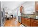 Bright eat-in kitchen featuring stainless steel appliances, and hardwood floors at 5649 Cobblestone Creek Pl # 13, Mableton, GA 30126