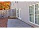 View of the home's fenced-in backyard and concrete patio area at 840 Ash St, Canton, GA 30114