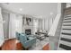 Bright and airy living room featuring a cozy fireplace and elegant decor at 840 Ash St, Canton, GA 30114