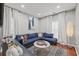 Comfortable living room with a stylish sectional sofa, natural light, and contemporary decor at 840 Ash St, Canton, GA 30114