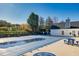 Community pool with cover; it is surrounded by trees and picnic tables at 840 Ash St, Canton, GA 30114