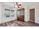 Dining room showcasing hardwood floors, crown molding, and classic china cabinet at 4940 Hanna Kate Ct, Cumming, GA 30028