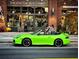 Porsche parked in front of Top Knot Boutique at 4940 Hanna Kate Ct, Cumming, GA 30028