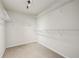 Walk-in closet with adjustable wire shelving providing ample storage space at 4940 Hanna Kate Ct, Cumming, GA 30028