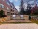 Outdoor grilling area with stone structure, stainless steel grills, and stone pavers at 625 Piedmont Ne Ave # 2004, Atlanta, GA 30308