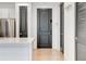 Chic kitchen with stainless steel fridge near elegant black accent doors at 625 Piedmont Ne Ave # 2004, Atlanta, GA 30308