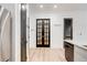 Contemporary kitchen area with stainless steel appliances and black accent doors at 625 Piedmont Ne Ave # 2004, Atlanta, GA 30308