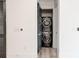 A laundry closet shows a stacked washer and dryer set, perfect for space-saving convenience at 625 Piedmont Ne Ave # 2004, Atlanta, GA 30308