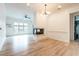 Spacious living room with a fireplace and large window at 625 Piedmont Ne Ave # 2004, Atlanta, GA 30308