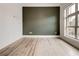 Inviting living room with beautiful laminate flooring and neighborhood views at 625 Piedmont Ne Ave # 2004, Atlanta, GA 30308