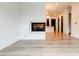 Bright living room featuring a modern fireplace and hardwood floors at 625 Piedmont Ne Ave # 2004, Atlanta, GA 30308