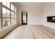 Spacious living room with fireplace, large windows and hardwood floors at 625 Piedmont Ne Ave # 2004, Atlanta, GA 30308