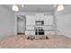 Well-lit kitchen featuring granite countertops, an undermount sink, and stainless steel appliances at 6920 Oak Valley Dr, Douglasville, GA 30134