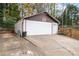 Detached garage with a wide door and plenty of space for vehicle and storage needs at 753 Brookwood Sw Ter, Lilburn, GA 30047