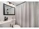 Bathroom with a shower curtain, modern fixtures, and a clean design at 1812 Defoor Nw Ave, Atlanta, GA 30318