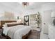 Bright bedroom featuring a large bed, neutral tones, and tasteful decor at 1812 Defoor Nw Ave, Atlanta, GA 30318