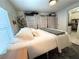 Bedroom with an organized closet, soft lighting, and comfortable furnishings at 1812 Defoor Nw Ave, Atlanta, GA 30318