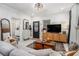 Bright living room with stylish decor, an open layout, and a view to the front entrance at 1812 Defoor Nw Ave, Atlanta, GA 30318